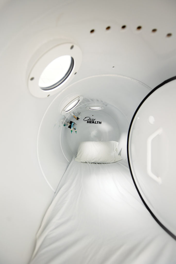 A porthole enables a hyperbaric technician to monitor the patient while in the chamber.