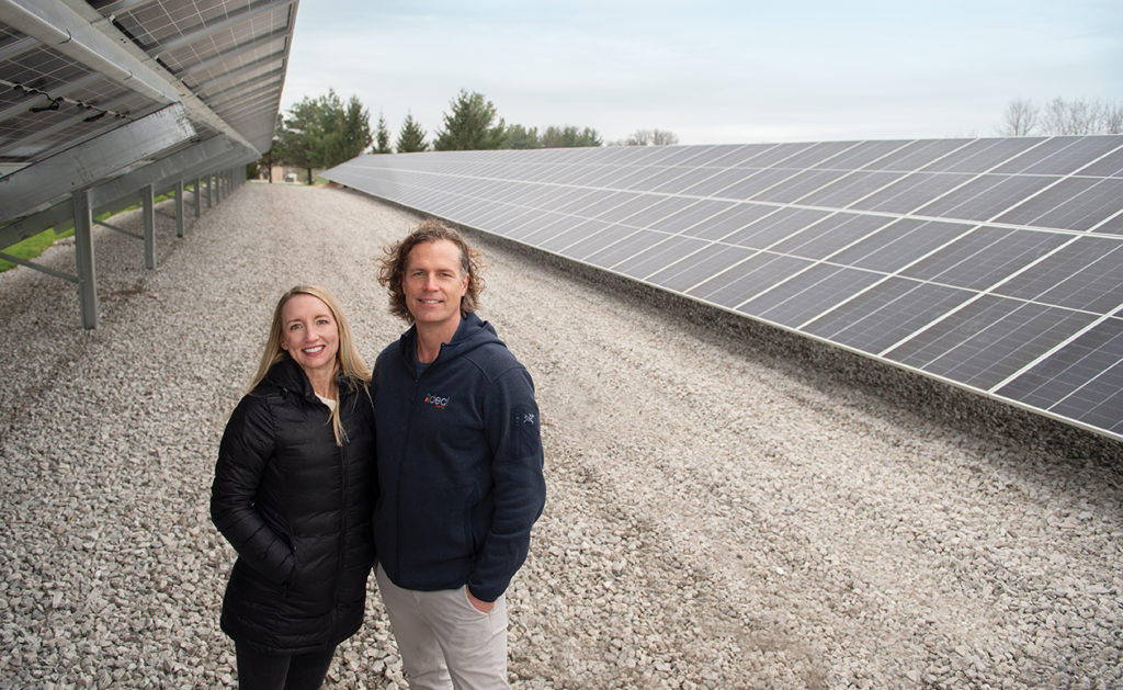 Amy and Troy Van Beek of Ideal Energy at a Fairfield client's solar project site.